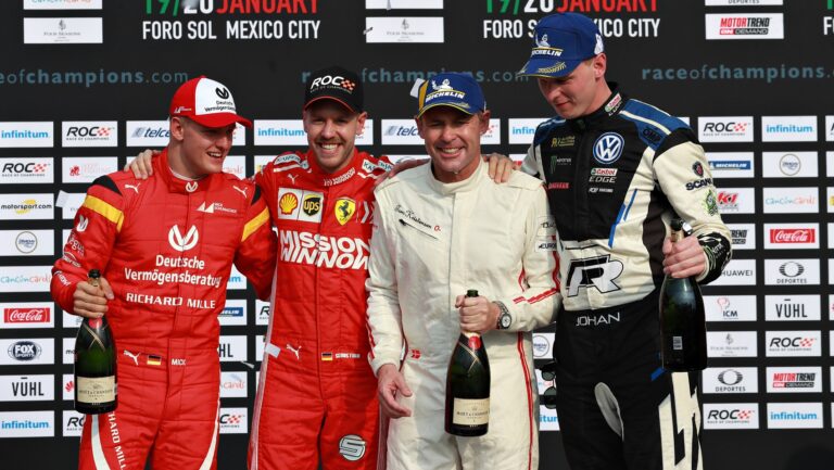 Tom Kristensen (DNK) and Johan Kristoffersson (SWE) of Team Nordic celebrate winning with runners up Sebastian Vettel (GER) and Mick Schumacher (GER)