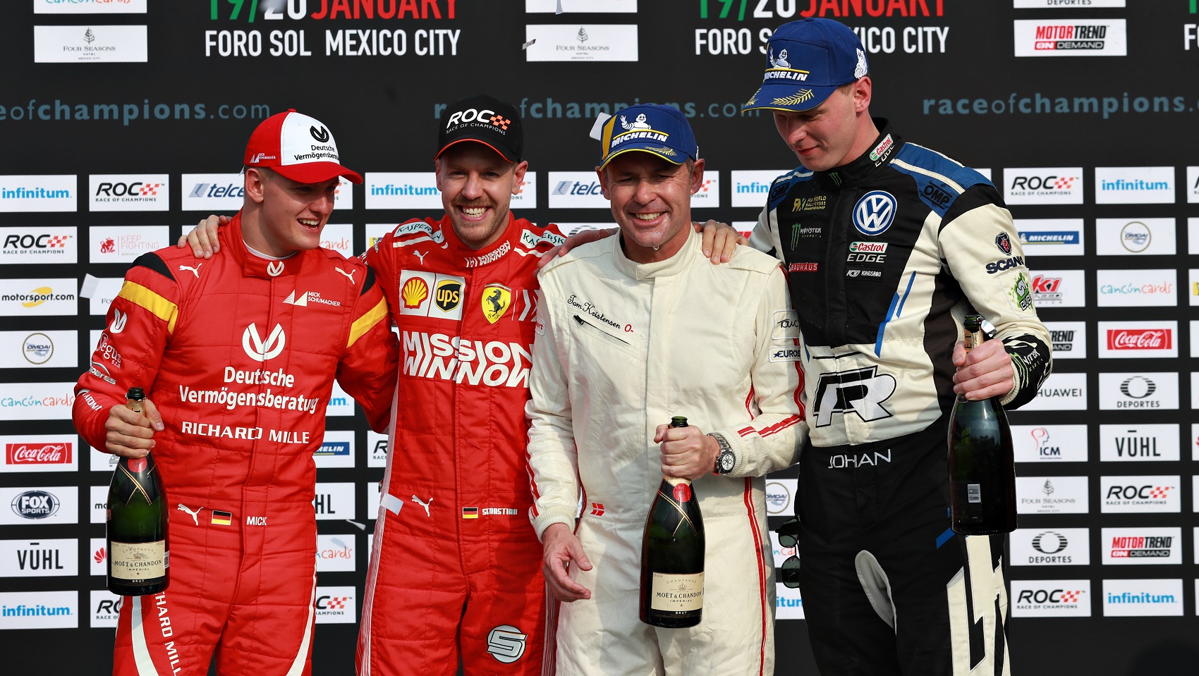 Tom Kristensen (DNK) and Johan Kristoffersson (SWE) of Team Nordic celebrate winning with runners up Sebastian Vettel (GER) and Mick Schumacher (GER)