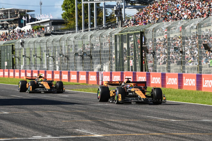 Oscar Piastri, McLaren MCL60, leads Lando Norris, McLaren MCL60